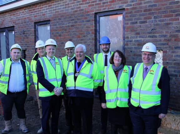 PMC site manager Billy Musselwhite and senior contracts manager Tim Guest, Cllr Christian Mitchell, HDC head of property Brian Elliott, Cllr Peter Burgess, head of community and housing Rob Jarvis, Cllr Tricia Youtan, and HDC chief executive Glen Chipp.

ENDS SUS-190218-155327001