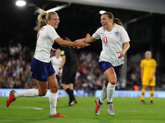 Fran Kirby and Toni Duggan celebrate an England goal in their friendly with Australia in October. Picture by Rob Newell (CameraSport via Getty Images)