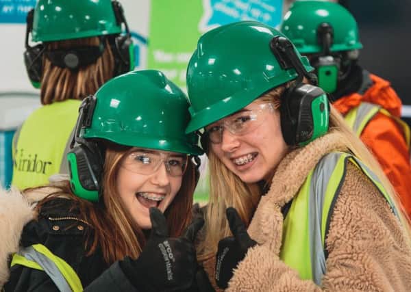 The Regis School students Poppy Wallis and Sophie Reeves in Year 9 during the Green Teams recent visit to Ford recycling Plant before they deliver assemblies to the whole school next month. SUS-190222-115753001