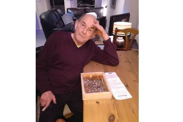 Ross Morgan, 75, with his box ready to be sealed
