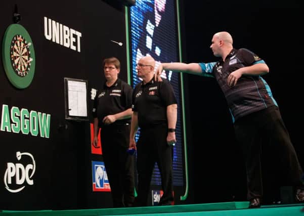 Rob Cross at the oche during his Unibet Premier League win over James Wade last Thursday. Picture courtesy Steve Welsh/PDC