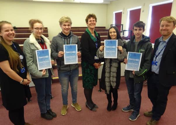 Students and teachers celebrated the success with Sally Bromley (centre)