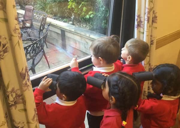 Residents and pupils during the birdwatch