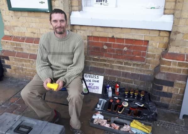 Dave Morgan is offering shoe shining outside Eastbourne station