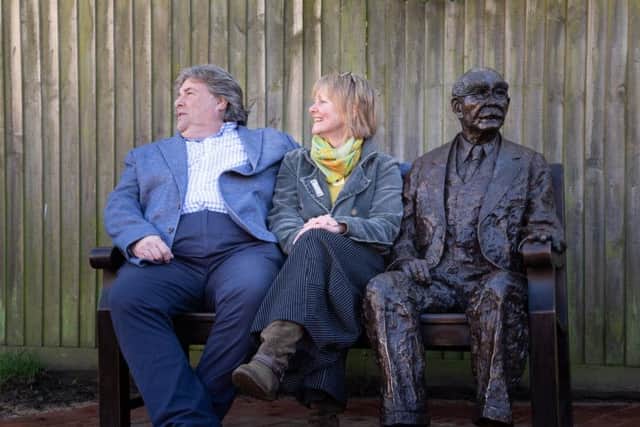 Councillor Steve Moore and Victoria Atkinson with the seated figure. Photograph: Ann Chown