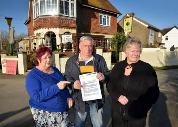 Three Oaks residents unhappy about a new sewage system. L-R Margaret Reeve, Clive Meekham and Sallie Cox