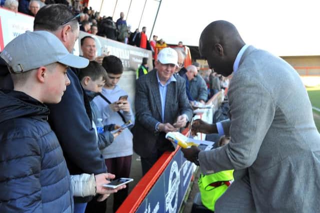 Former Tottenham Hotspur and Arsenal defender signs autographs during his visit to the People's Pension Stadium as manager of Macclesfield Town.
Picture by Steve Robards.