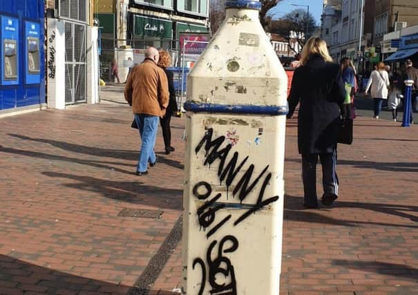 Graffiti on a lamp post in Terminus Road, photo by Ben Atherton