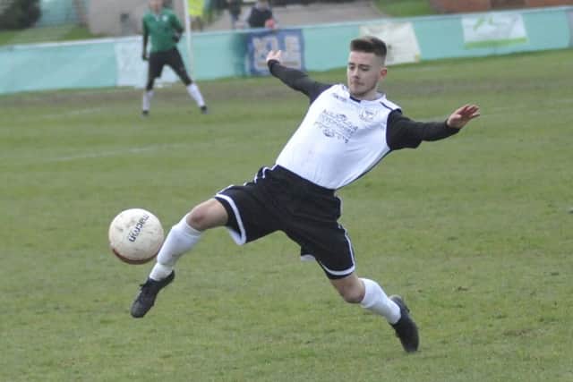 Kyle Holden scored the opening goal in Bexhill United's 2-0 win away to Sidlesham. Picture by Simon Newstead