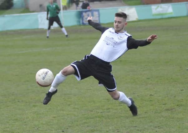Kyle Holden scored the opening goal in Bexhill United's 2-0 win away to Sidlesham. Picture by Simon Newstead