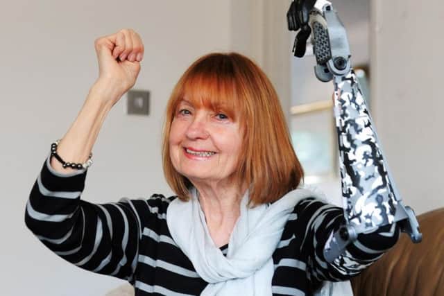 Annastasia Feltham from Clymping is delighted with her 3D printed arm. Picture: Kate Shemilt