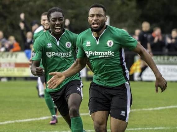 Burgess Hill Town defender Cheick Toure (right) celebrates scoring against Wealdstone in the FA Cup in 2017.