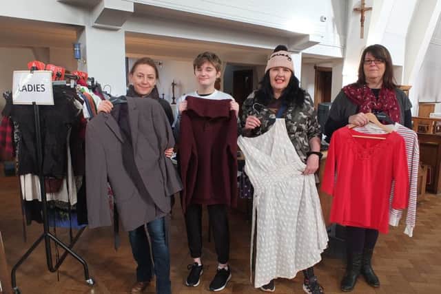 A group people who took part in the clothes swapping event