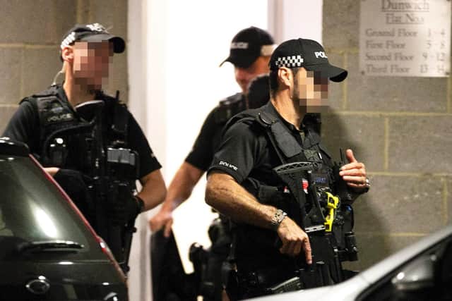 Armed officers were called as part of the police response