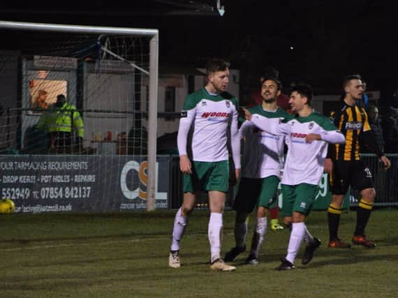 Jimmy Wild is congratulated on a goal that helped Bognor beat East Grinstead in January to reach the SSC semis / Picture by Darren Crisp