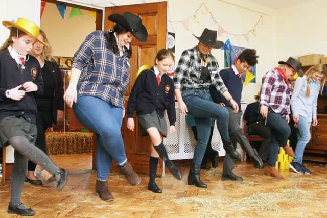 Line-dancing at the American-style hoedown at St Wilfrids Arundel Priory. Photo by Derek Martin DM1924297a