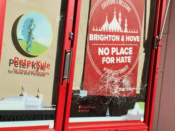 The damage to the window at Peter Kyle's constituency office in Hove