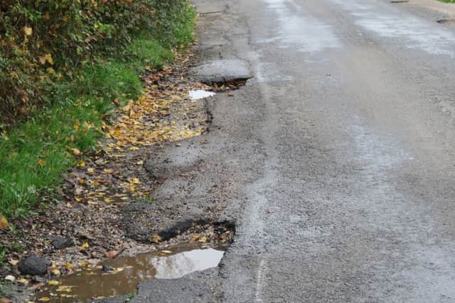 Potholes in Woodhorn Lane between Oving and Colworth SUS-190227-170613001