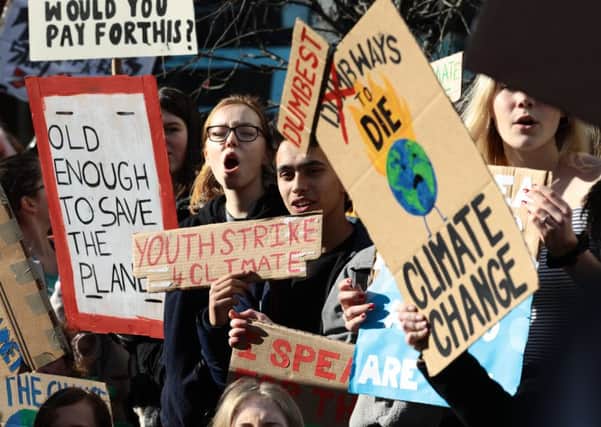 Schoolchildren take part in a student climate march on February 15, 2019 in Brighton 775299408