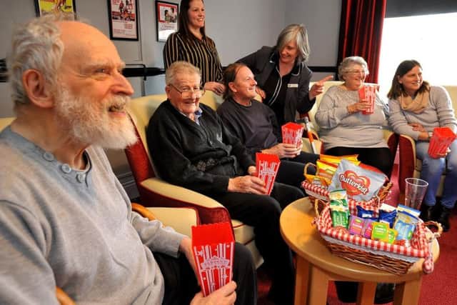 Residents enjoying the theatre room. Pic: Steve Robards