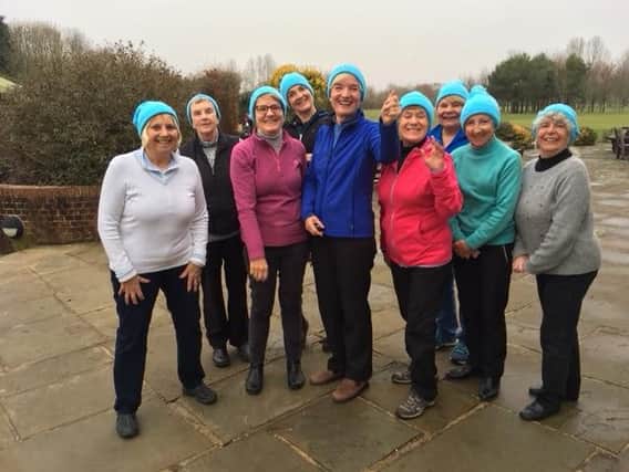 Chichester ladies wear hats to support the lady captain's charity