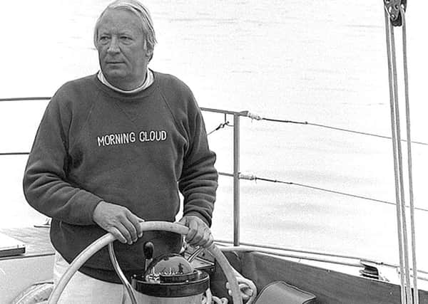 Premier Edward Heath at the wheel of his yacht Morning Cloud. Picture: Tim King.