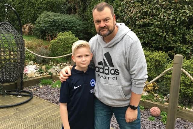 Ian Miller, 50, from Findon, with his son Alfie, 11