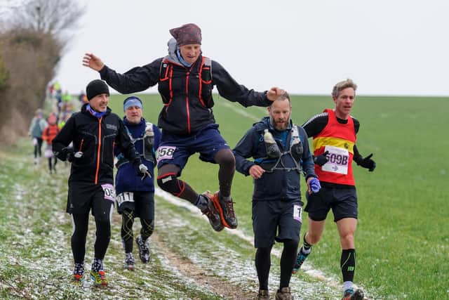 Andrew Pumphrey, number 058, gets into his stride down Housedean Farm at last year's marathon. Photograph: James McCauley