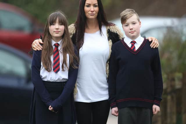 Jacqueline Brook with her children Tiggy (left) and Leon, both 10. Pic: Eddie Mitchell