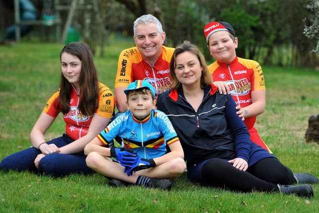 Steve Earl with wife Sarra, and children Ivan, 9, Alfie, 11 and Saskia, 14. The family are taking part in the Tour of Flanders in Belgium to raise money for the British Heart Foundation. Photo: Steve Robards SR1905855 SUS-190203-140411001