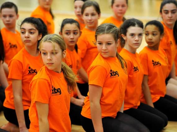 Worthing High School students perform routine at new dance studio