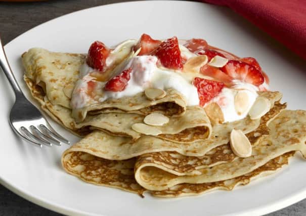 Berryworld strawberry, toasted almond and caramel pancakes. Picture: Berryworld.com SUS-180213-124829001