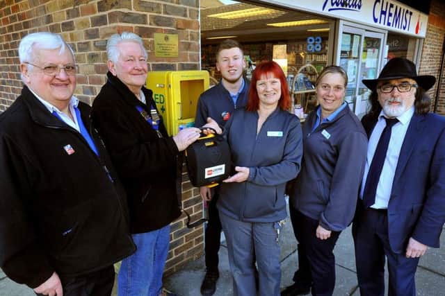 Sam Patel from the chemist is pictured with Co-ops Craig Smith, Vicki Jones and Gina Anderson, and Lions John Gee and Tony Parris. Photo by Steve Robards