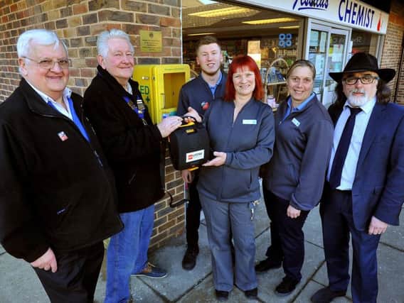 Sam Patel from the chemist is pictured with Co-ops Craig Smith, Vicki Jones and Gina Anderson, and Lions John Gee and Tony Parris. Photo by Steve Robards