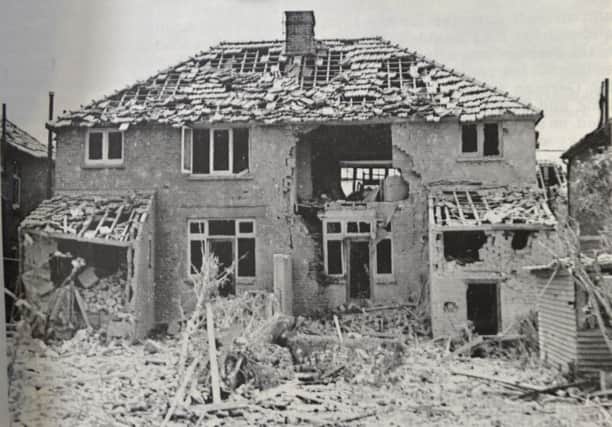 Damage to the rear of a pair of semi-detached houses in Northbourne Road  on October 6 1940