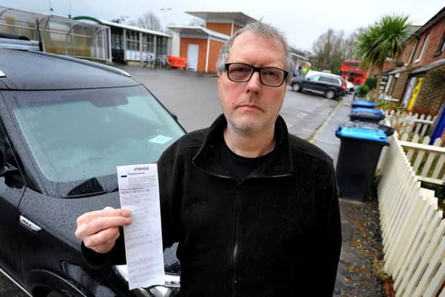 David is challenging the parking fine. Photo by Steve Robards