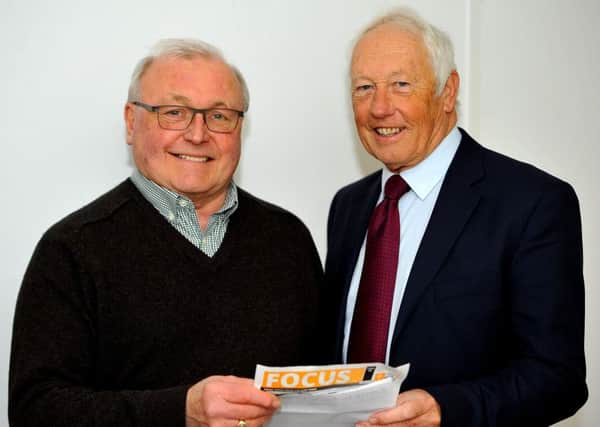 Alan Britten, who has defected from the Conservatives to the Lib Dems, with Lib Dem group leader David Skipp. Pic by Steve Robards