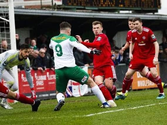 Action from Worthing's clash at Bognor. Picture: Tommy McMillan