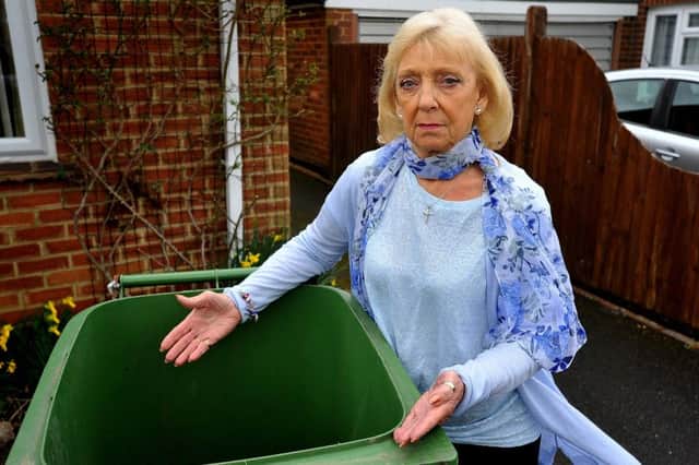 Betty Wells and her lid-less bin. Photo: Steve Robards