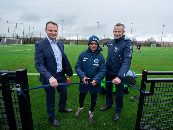 Brighton Women boss Hope Powell (centre) officially opens the new all-weather surface