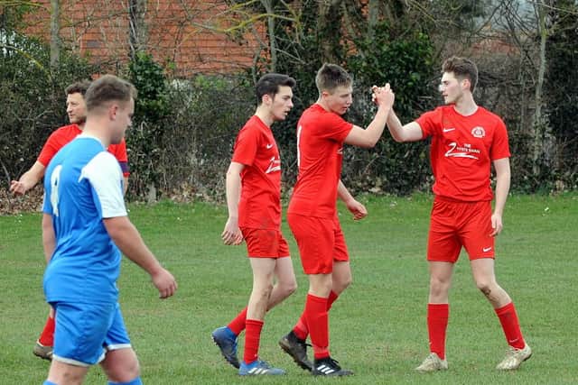 Mutual respect for scorer George Briance from team-mates Alex Jarrom and Ben Metherell / Picture by Kate Shemilt