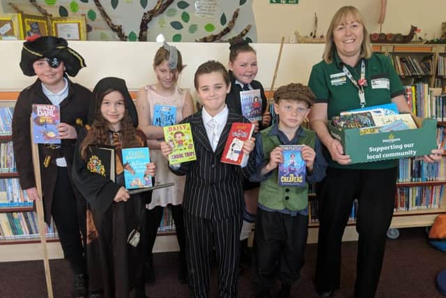 White Meadows pupils Jayden Elliott as a pirate, Nikola Chmieolska as Hermione, Summer Lane as Dobby, Aston White as a gangster, Taylor Gardner as Miss Trunchbull, Harry Carn as Oliver Twist and Alison Whitburn, Morrisons Community Champion