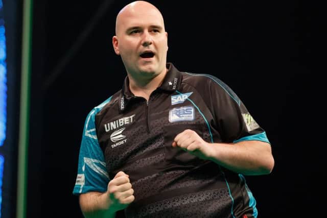 Rob Cross celebrates during his 7-3 victory over Michael Smith. Picture courtesy Steve Welsh/PDC