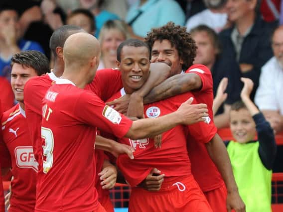 Crawley players celebrate Wes Thomas' goal against Macclesfield (Pic by Jon Rigby)