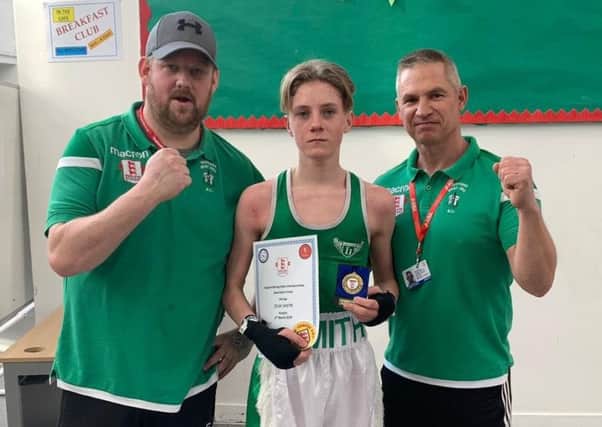 Jesse Smith with West Hill Boxing Club coaches Dave Bishop (right) and Mike White