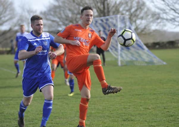 Action from the top-of-the-table clash between Sidley United and Battle Baptists. Pictures by Simon Newstead
