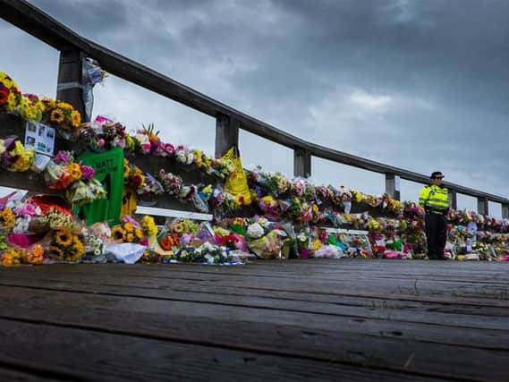 Floral tributes laid at Old Toll Bridge in Shoreham following the tragedy