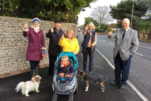 Councillors with chairman Ken Carr and residents Virginia Kemp and Nicky Prior with grandson Ledley