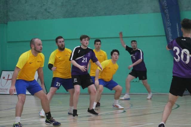 The University of Chichester men's handball ones (in yellow) made it to the last eight. Picture by Evan Griffiths.