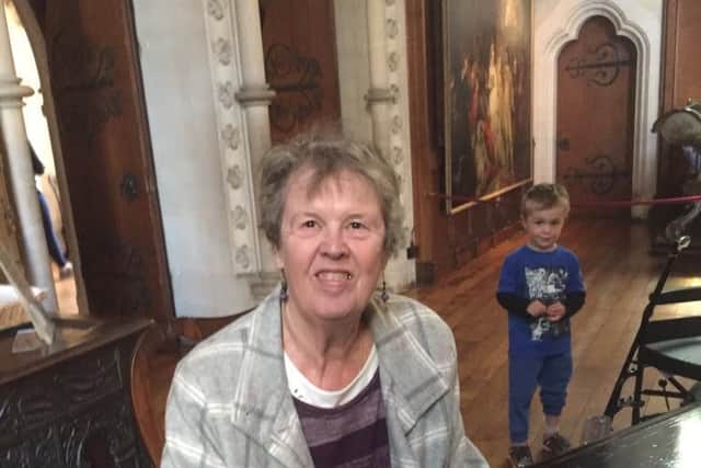 Gill with her grandson Luke, playing at Arundel Cathedral